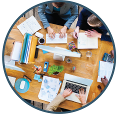 circular photo people working at a desk