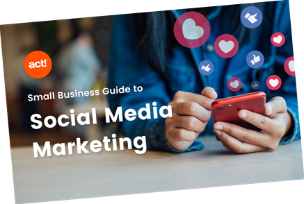 small business guide to social media marketing with a photo of person holding a phone and likes and hearts floating out of it