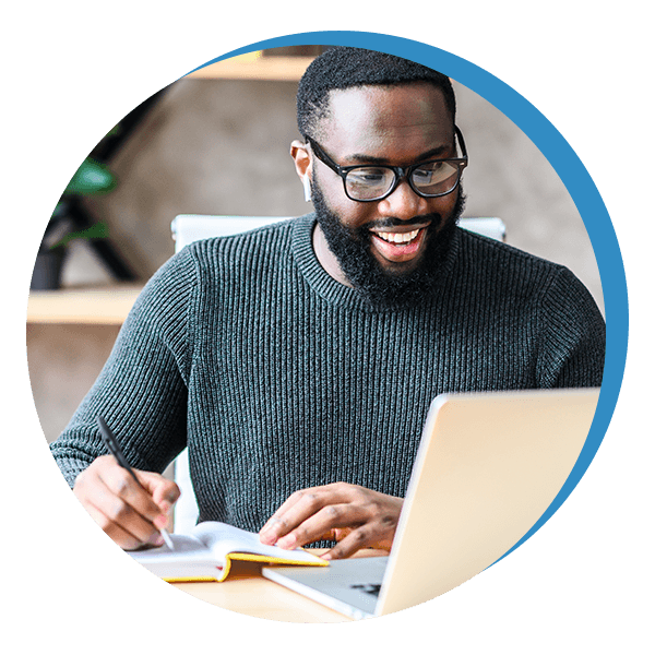 A man writing in a journal