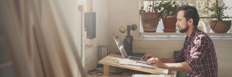 a man on computer
