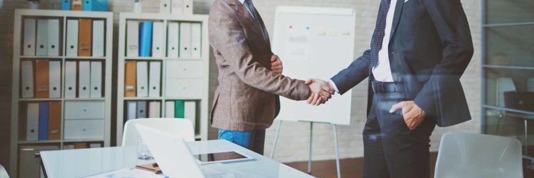 to men shaking hands