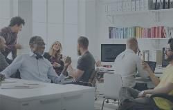 Small compressed photo of people in a business setting
