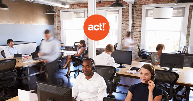 people working in an office space on computers with the act! CRM logo overlayed