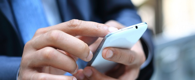 Man holding a phone with two hands