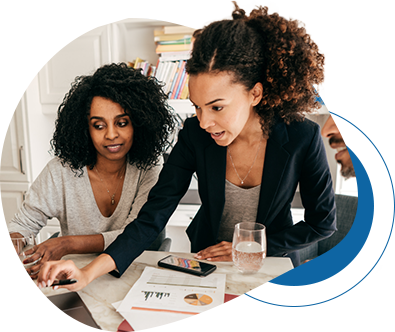 Two women talking at the computer