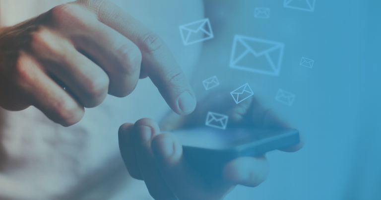 finger touching phone with email icons coming out of it